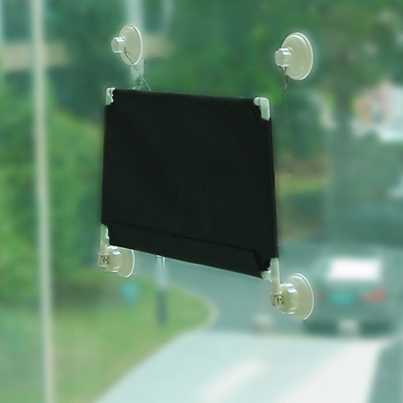 Hamac de fenêtre noir pliable pour chat — fixé sur une vitre